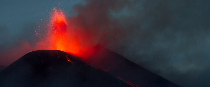active volcano mount etna spewing molten lava